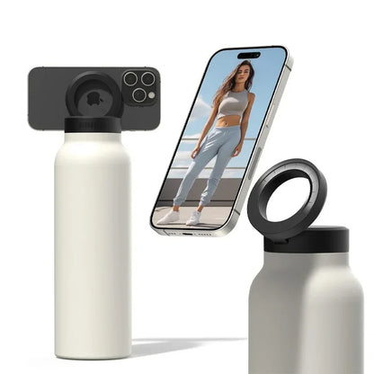 Isolierte Sport-Trinkflasche mit magnetischer Handyhalterung und integriertem Ständer – perfekt für Fitnessstudio, Outdoor-Abenteuer und Reisen.